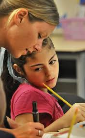 Summer's over: Dickinson Elementary, other year-round Grand Rapids students  get back to learning