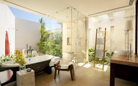 The brass mirror really stands out against the gray wallpaper while the two brown nickel and glass wall sconces tie it all together. Modern Bathroom Design Ideas Wallpaper Other Wallpaper Better