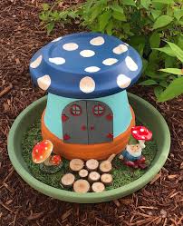 Some little fairy left a cartful of blooms behind. How To Make A Fairy Garden In Four Easy Steps Mod Podge Rocks