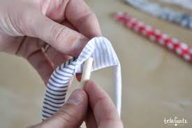 Match up the 2 short ends of the ribbon to fold it in half. Easy Hair Bow Tutorial