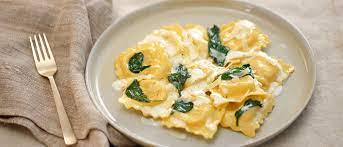 Recipes Chicken Roasted Garlic Ravioli With Creamy Spinach Sauce Giovanni Rana Recipe Creamy Spinach Sauce Recipes Cooking Spinach
