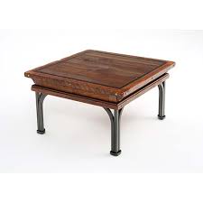 The only flaw is one of the bottom shelf came with chip in the side. Red River Tombstone 36x36 Coffee Table Green Gables