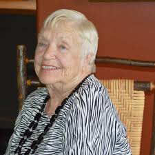 Woman pulls back veil