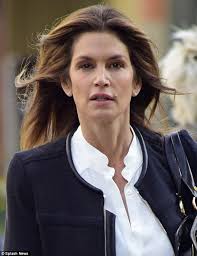 Cindy Crawford, 48, looks flawless all made up in New York ...a day after  posting her no make-up selfie