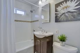 Freestanding bath in grey bathroom. 75 Beautiful Gray Bathroom With Brown Cabinets Pictures Ideas July 2021 Houzz
