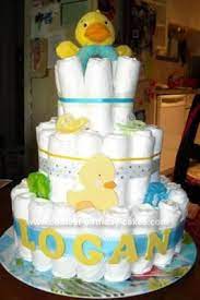 A baby nappy cake, diaper animal or diaper bouquet are a great gift for baby showers diaper cakes are ideal for every new, expectant and 'mom of many'. 32 Pampers Cake Ideas Pamper Cake Baby Shower Diaper Cake