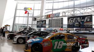 Enter beneath the futuristic chrome roof into a round glass hall, where nascar's story plays out on a giant screen. Nascar Hall Of Fame 1519039
