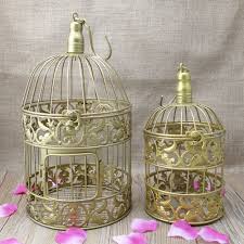 A container to hold creatures humans are obsessed with specifically for their freedom and ability to soar through the air. Aliexpress Com Buy Handmade 1 Set Fastion Iron Birdcage Gold Metal Decorative Bird Cage Birds Case For Wed Bird Cage Decor Bird Cage Bird Cage Candle Holder