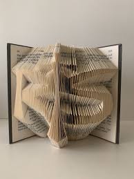 Find nautical anchor decor and more here at our nautical store. Runescape Logo Book Pattern Book Folding Pattern Book Etsy Folded Book Art Book Folding Patterns Book Folding
