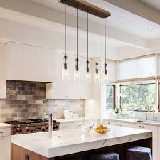 Overall, there is no exact science to kitchen island lighting since much of the decisions depend on you and your kitchen, but if you follow these general guidelines, you will be able. Lnc 5 Light Clear Glass Pendant Diy Adjustable Wood Modern Farmhouse Linear Dining Chandelier With Clear Wine Bottle Shade A02982 The Home Depot Modern Farmhouse Lighting Kitchen Island Lighting Kitchen Ceiling Lights