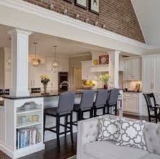 Perfect Way To Transition Ceiling Heights And Hide Structural Posts The Brick On The Wall Is Also Cool But Probably Wouldn T Home Home Remodeling Home Decor