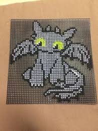This is a pdf counted cross stitch pattern available for instant download. Toothless Cross Stitch Pattern Novocom Top