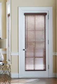 If you have sliding doors you can install a game on each side to make things easier. 1 Inch Faux Wood Blinds Blinds Com In 2021 French Door Window Treatments Faux Wood Blinds Blinds For French Doors
