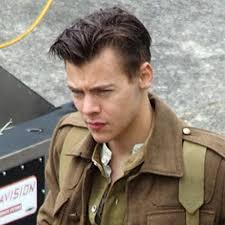 Harry Styles Showcases His New Haircut—and in Uniform