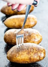The potatoes should be washed well, and then pricked in several places to keep. How To Bake Potatoes Craving Home Cooked