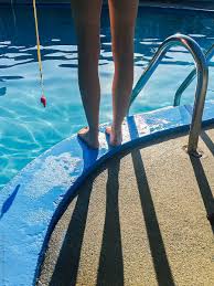 Lifeguard At Swimming Pool Stocksy United By Raymond Forbes Photography Stockphoto Stockphoto Swimming Pool Photography Pool Photography Summer Photography