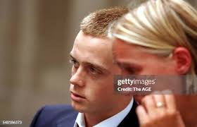 Skateboarder Benjamin Pappas, left, leaves court with his girlfriend,...  News Photo