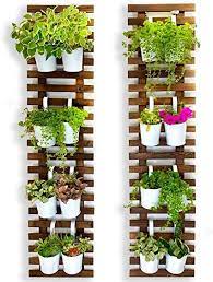 See more ideas about planters, metal wall planters, vertical garden. Amazon Com Wall Planter 2 Pack Wooden Hanging Large Planters For Indoor Outdoor Plants Live Vertical Garden Plant Wall Wall Mount Plant Holder Stand Room Decor Garden Wall Trellis For Climbing