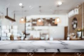 Wrapping up this week like >>>>. Empty Top Of White Marble Table With Blur Cafe Or Coffee Shop Stock Photo Picture And Royalty Free Image Image 111174202