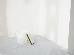 Here, you apply another coat of joint compound to the tape and screws and sand the dried compound. Drywall Finish Levels Explained