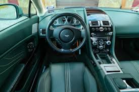 Image result for Hardly Green 2012 Aston Martin