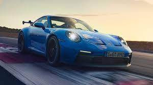 Since for now, the gt3 comes only in one trim, but even after the release of the touring trim and the gt3 rs, unless some drastic changes undergo in these trim, we would recommend the standard gt3 trim, as it sits in between with all the features of a touring car as. 2022 Porsche 911 Gt3 Debuts With Huge Wing 502 Hp And New Suspension
