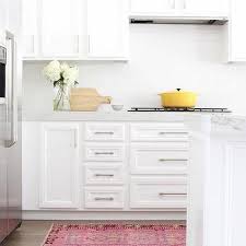 In the world of cabinet fronts, plykea might be your best option for that look: Ikea Kitchen Cabinet Hardware Design Ideas