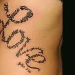 Beautiful faith quote tattoo on rib side. Christian Tattoos The Best Ones To Show Your Faith Christian Tattoo Art