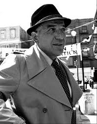 He then sets out to take his revenge on the woman and the gang boss who put her up to it. Telly Savalas