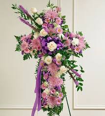 Send your love with the delivery of a beautiful funeral cross arrangement. Lavender Standing Cross Roslindale Florist