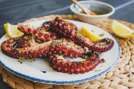 Grilled Octopus With Lemon Oregano Jess Pryles Recipe Grilled Octopus Octopus Recipes Grapefruit Recipes