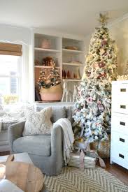 Christmas Tree Decor In Our Small Family Room Flocked Tree Pink Ornaments Small Christmas Decorations Living Room Christmas Living Rooms Small Family Room