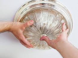 The types that remove in this manner have some spring wires that will fold down from the ceiling when pulling down on the fixture. How To Remove A Light Fixture Apartment Therapy