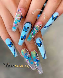 Sweet cornflower blue nails gently set the stage for the centerpiece of this look, a beautiful blue crystal butterfly charm. The Cutest Light Blue Nails To Try In 2021 Cute Manicure