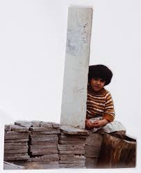 Free to download and use for your mobile and desktop screens. A Child Sitting On Top Of A Wall The Palestinian Museum Digital Archive Pmda
