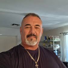 What is causing yellow foam and residue in my hot tub after draining and  refilling?