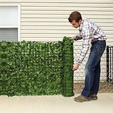 Extend the fence with plants. Stretchable Privacy Fence Screen Artificial Decoration A Green Plants Fence Telescopic Green Plants Decor Fence Green Leaf Fence For Garden Outdoor Yard Patio Lawn Garden Outdoor Decor Urbytus Com