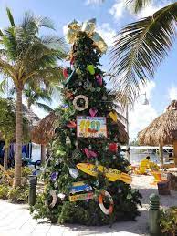 Christmas tree ornament 2019 our first christmas in north port florida 1st christmas in our new house rustic xmas decorations gift for family present idea 3 flat ceramic ornament 14 99 14. Fun Tropical Christmas Decorations To Inspire A Florida Holiday Getaway