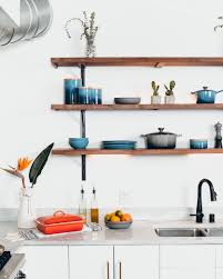The vertical space is utilized by hanging cabinets that blend well with the light gray walls. I Pinimg Com Originals 7f C9 96 7fc9964cbfc5446