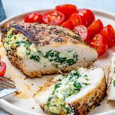 Turducken is a dish consisting of a deboned chicken stuffed into a deboned duck, further stuffed into a deboned turkey. Spinach And Cheese Stuffed Chicken Healthy Fitness Meals