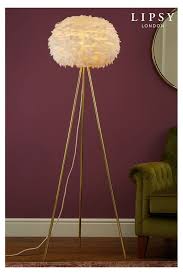 The aynhoe ostrich feather floor lamp is available in sixteen opulent hand dyed shades and four hand finished resin base tones. Feather Floor Lamp Featherfloorlamp In 2021 Gold Floor Lamp Standing Lamp Floor Lamps Uk