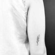Lavender Sprig Tattoo On The Back Of The Right Arm Minimalist Lavender Tattoo Tattoos Small Tattoos