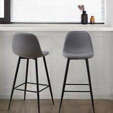 Each stool is crafted from iron in a bronze finish, and it's built on four tubular legs with a swivel seat and a thin, rounded footrest, offering some convenience while you sit. Bar Stools 10 0 Dealsan