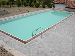 Piscina Interrata A Sfioro Con Griglia In Legno Disinfezione Ad Ozono E Filtrazione A Diatomee Aepiscine
