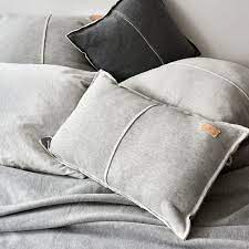 would you like to spend a lazy day in bed if your answer is yes we have the perfect cushions for you made of soft and warm cott kussens grijze kussens