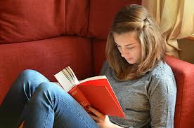 Chica leyemdo un libro wallpaper. Hd Wallpaper Boy Sitting On Book And Reading Book Preschool Kindergarten Wallpaper Flare