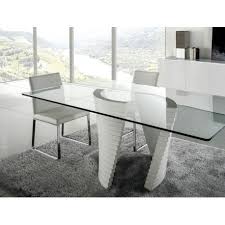 There is a lot to be said for sharing laughter around the dinner table, whether that's around a high gloss table, a contemporary design or a glass top set. Elegante High Gloss Dining Table With Glass Top Dining Tables 1226 Sena Home Furniture