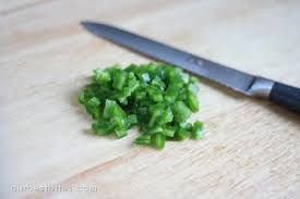 Halve the jalapeño lengthwise for removing the seeds with a spoon. How To Work With Jalapenos Our Best Bites