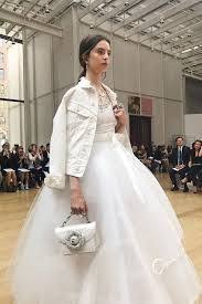 White Jean Jacket With Wedding Dress Google Search Wedding Dresses Denim Wedding Dresses For brides with a boho sensibility, this white fringe and denim jacket will stun all the way from the aisle to the dancefloor. white jean jacket with wedding dress