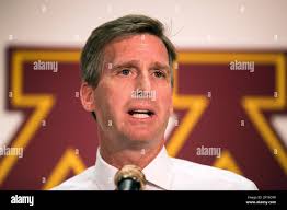 University of Minnesota athletics director Mark Coyle speaks during a press  conference Wednesday, Sept. 7, 2016, at the Sports Arena in Minneapolis.  Longtime Minnesota wrestling coach J Robinson was fired Wednesday after